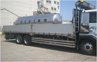 A truck carrying a container of phosphoric acid